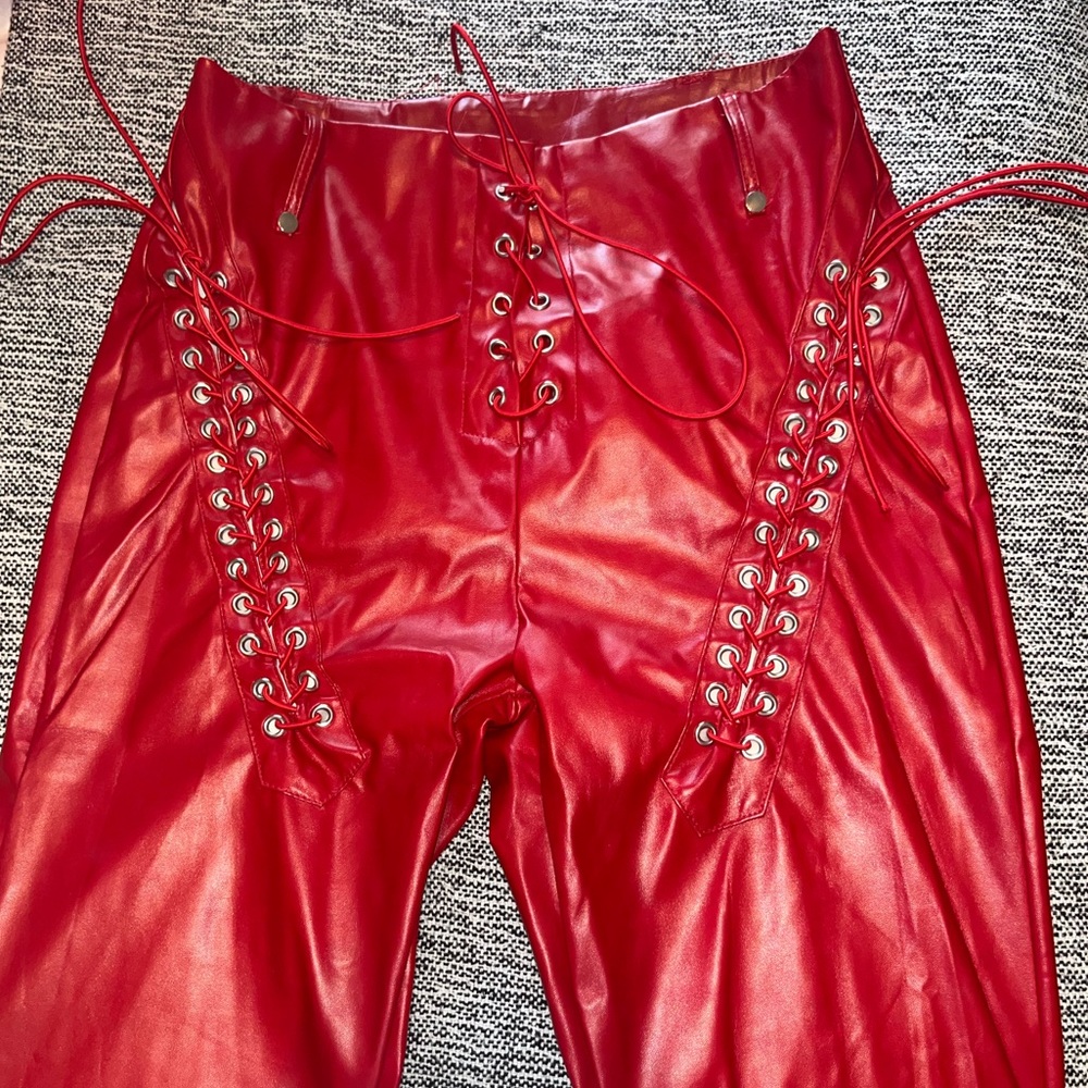 Red lace up faux leather pants